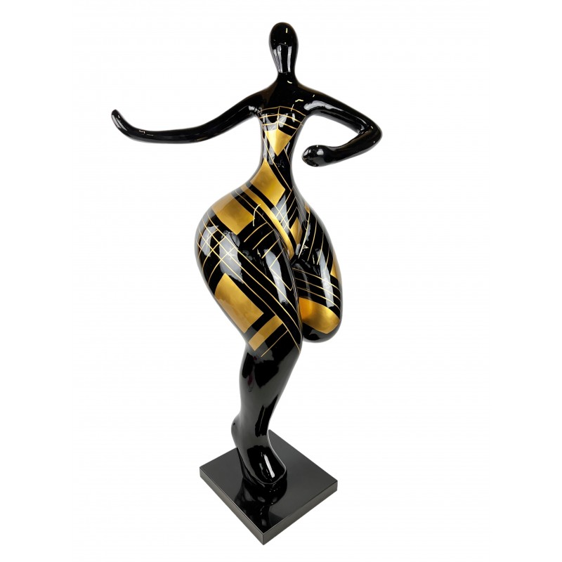 Statue en résine représentant une danseuse en résine noir et or
